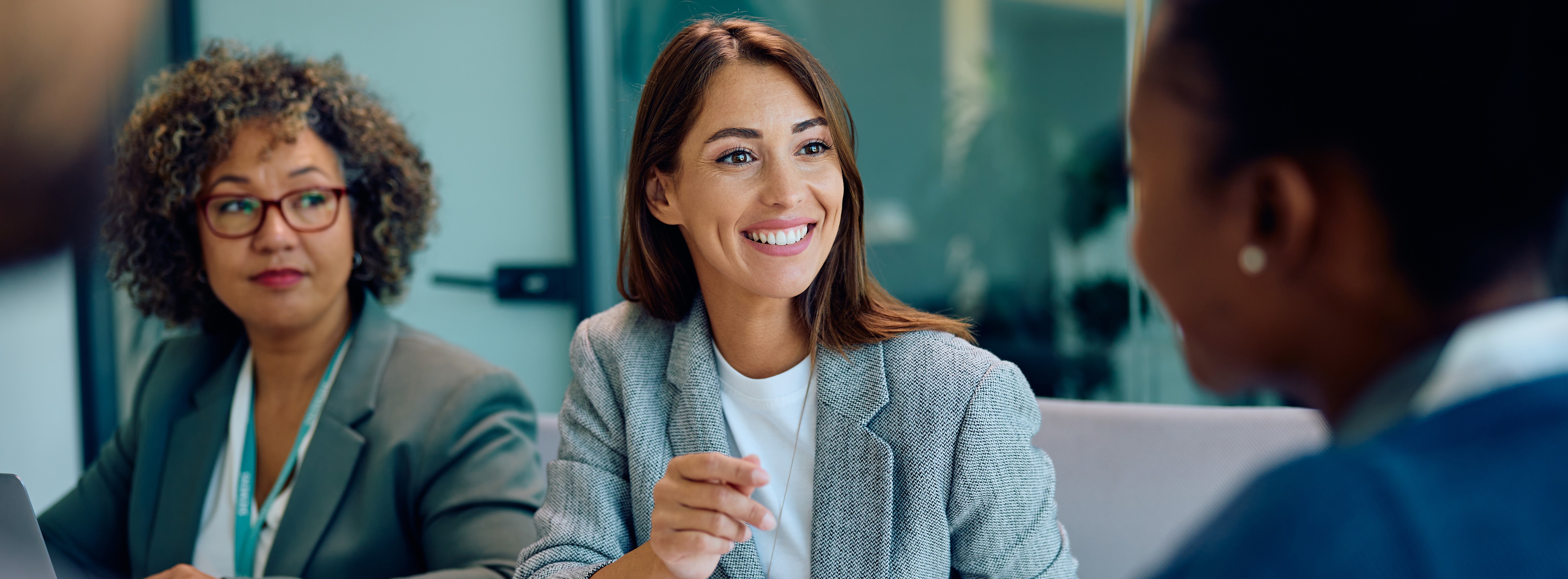 Two young professionals discussing career options