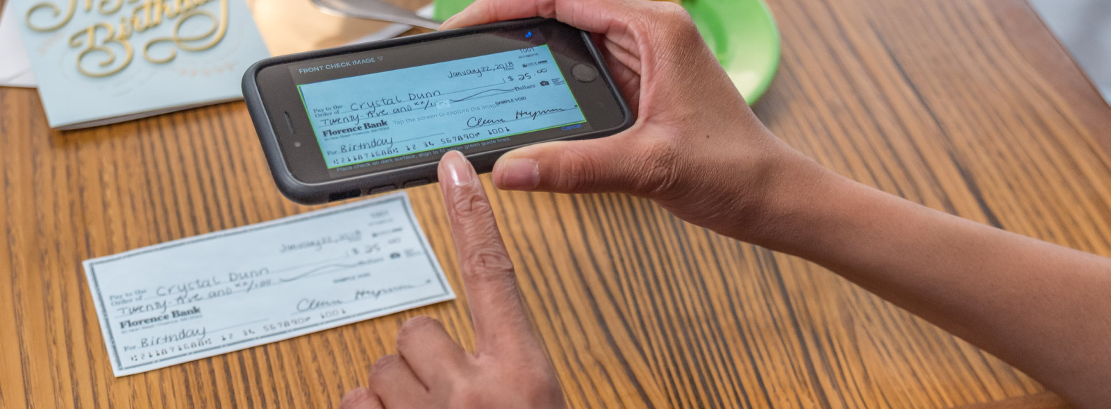 Mobile deposit capturing a check image on mobile device.